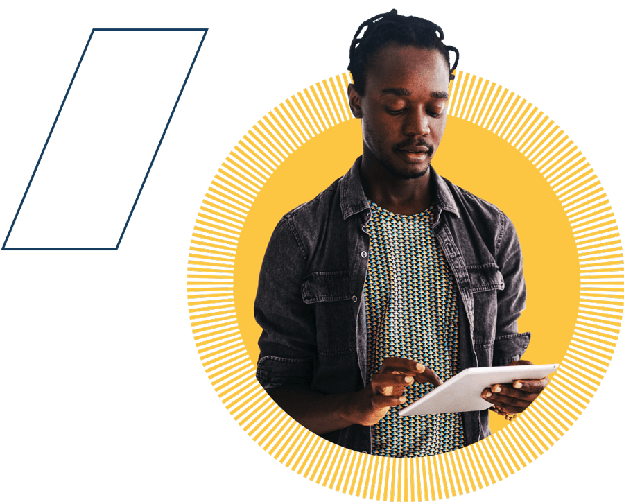 Photo of a man wearing a denim jacket holding a tablet on a yellow burst background