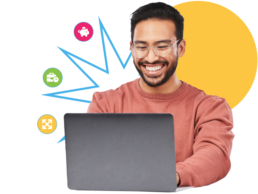 Photo of a happy man at a laptop wearing an orange shirt and glasses